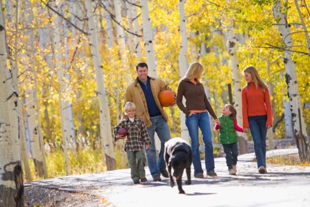 family walking through woods in pasadena ca..